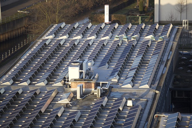 Solar Panels Mounted on the Flat Roof of a Commercial Building
